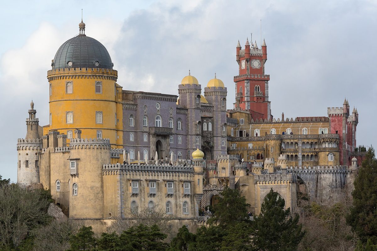 The palaces of Sintra, 40 minutes west.