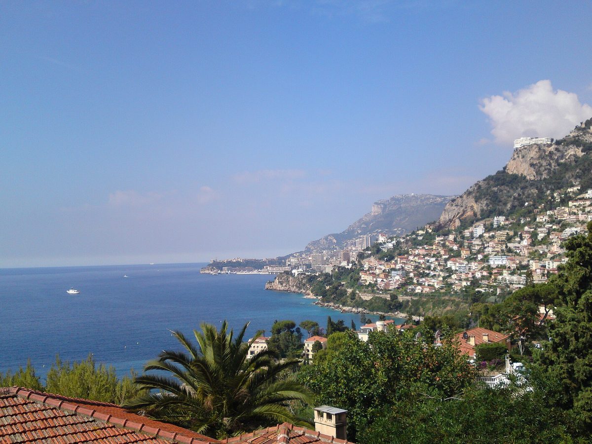 Monaco, under an hour east.